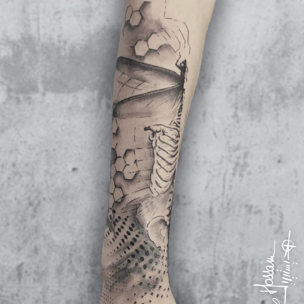 Abstract sleeve tattoo - Avantgarde Tattoo Barcelona